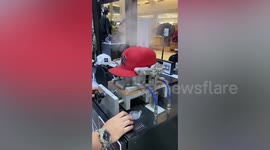 Ironing machine makes old worn-out cap look brand new