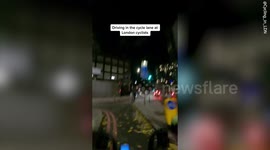 Shocking moment driver mounts busy cycle lane as multiple cyclists narrowly avoid collision during London rush hour
