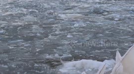 Ice-filled waves crash Lake Superior in Ashland, Wisconsin