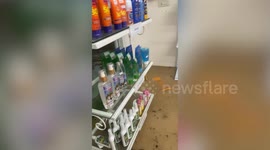 Pharmacy flooded after heavy tropical rain in Phuket, Thailand