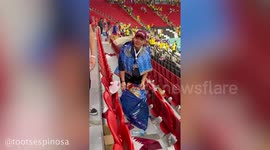 Japanese fans clear away rubbish left after World Cup game in Qatar
