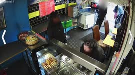 UK restaurant owner tackles knifeman in his shop a year after his 14-year-old son was stabbed to death