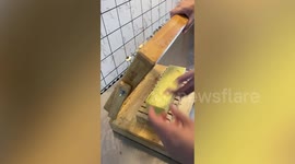 Satisfying video shows log of soap being sliced into bars