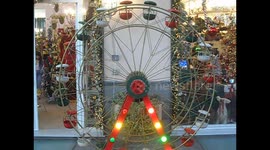 A large panoramic wheel runs out of a toy shop in Naples