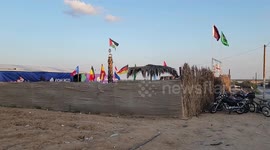 Palestinian fans attend the football match between Tunisia and Denmark during FIFA World Cup Qatar 2022 at a cafe shop near the fence between Gaza Strip and Israel, in Khan Younis in the southern of Gaza strip