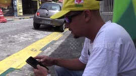 Fans line the streets of São Paulo, Brazil for the World Cup