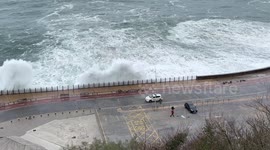 Huge waves crash over seawall as Storm Denise hits Spain