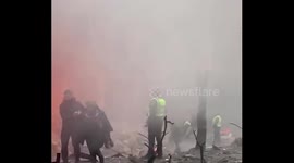 Three killed after strike hits residential building in suburb north of Kyiv