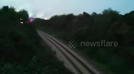 Mesmerising footage captures the practice run for Dartmouth's Train of Lights 2022 as it passes through the countryside