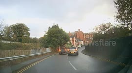 Idiot Driver drives into Police tape after overtaking in a 30mph zone.