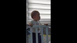 An adorable seven-month-old baby can't stop dancing