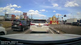 Out-of-control pickup truck crashes into electric pole at busy junction in Thailand