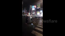 Excited Japanese fans celebrate historic victory over Germany at World Cup