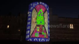 Christmas-themed artwork is displayed on outer wall of England's Windsor Castle