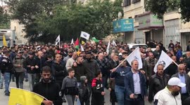 Palestinians carry the bodies of Mohammad Abu Kishk and Mohammad Harzallah during their funeral