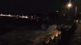 Huge waves batter Porthleven seafront after spate of recent storms in UK