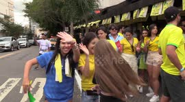 Fans watch Brazil’s first match against Serbia in Sao Paulo, Brazil