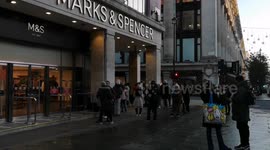 Black Friday: People queue outside Marks & Spencer on London's Oxford Street