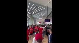 Welsh and Iranian Fans In the Train Station Ahead of Todays Game