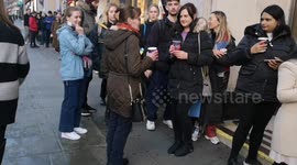 Black Friday: Large queue outside Marks & Spencer on London's main shopping Street, Oxford Street