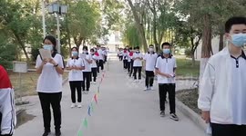 File Footage Of Students Lining Up To Make Nucleic Acid in Hami, China