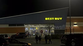 People are doing shopping at Best Buy on Black Friday for sales prices after Thanksgiving Day