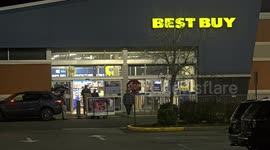 People are doing shopping at Best Buy on Black Friday for sales prices after Thanksgiving Day.