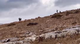 Palestinian demonstrators participate in the weekly a protest against settlement in the village of Beit Dajan