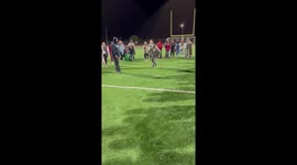 Hilarious kids vs parents football drill sees dad wipe out son with brutal tackle