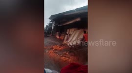 Flash flood washes away furniture from shop during thunderstorm