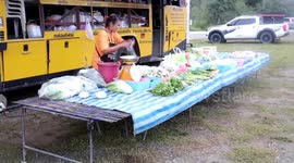Driver converts old school bus into roving grocery store after pandemic in Thailand