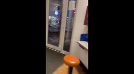 Musician surprises Chipotle customers by bursting into store playing saxophone through traffic cone