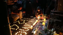 Candlelit vigil for the Urumqi fire victims, Sydney, Australia