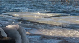 Cool sounds of icy waves crashing against the shores Lake Superior
