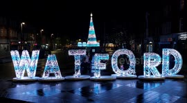 Wonderful Christmas Tree-mendous Families take pictures with the Large Town Sign