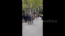 Residents clash with police in Shanghai over China's COVID-19 measures