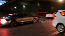 Albanians create choas on the South Bank in London as they block roads whilst celebrating their Independence Day