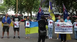 Ukrainians and their supporters protest against the Russian Red Cross in Sydney, Australia