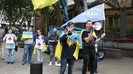 Ukrainians and their supporters protest against the Russian Red Cross in Sydney, Australia