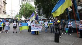 Ukrainians and their supporters protest against the Russian Red Cross in Sydney, Australia