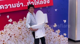 Cinema-goers fill TOILETS and other wacky objects in 'bottomless popcorn' promotion