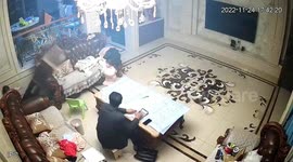Girl narrowly avoids being hit by falling grandfather clock in China