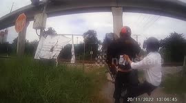Motorcycle flips over while rider tries to go over level crossing