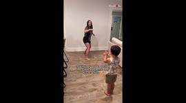 Woman dupes her child by handing him front-facing camera and asking him to record her dance!