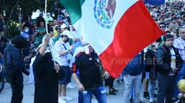 Mexican flag tangled in the flag at the FIFA Fan Fest in Mexico City