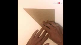 'Origami!' Portuguese artist creatively folds paper into an expressive face mask!