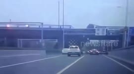 Speeding Porsche falls off overpass in eastern China