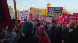 University workers march in London over pay, working conditions and pensions