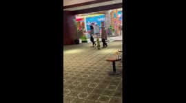 A toddler running away from her mother bumps into the glass door!