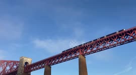 Watch as train disappears into thick fog while crossing the Forth Rail Bridge near Edinburgh